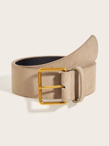 Close-up of wide beige suede belt featuring a large square golden metallic buckle