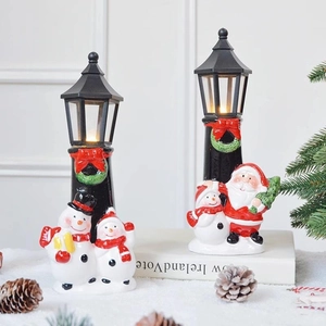 Christmas ceramic lighthouse scene with Santa Claus and Snowman led holiday ornaments