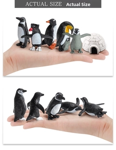 Actual size comparison of realistic miniature penguin animal figures and an igloo accessory