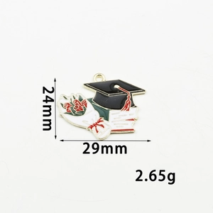 Enamel graduation cap and diploma charm pendant in black and red alloy with gold trim