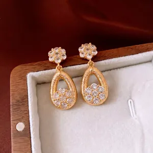 Vintage 18K gold plated teardrop earrings with floral studs and sparkling crystals