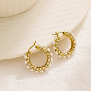 French style gold hoop earrings featuring white pearls and sparkling cubic zirconia stones