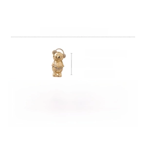 Macro view of golden bear brooch with sparkling rhinestones and earphone detail