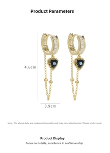 Detail view of heart drop earrings with tassels showing dimensions 4.6cm by 0.9cm