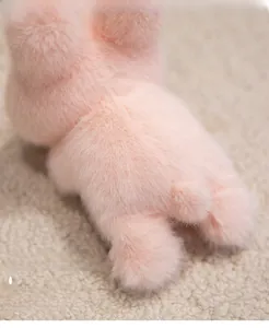 Close-up of soft pink plush biscuit cushion with high-elasticity fiber texture
