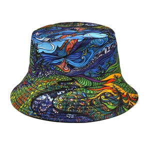 Detailed view of the vibrant geometric graffiti print and stitching on the reversible bucket hat