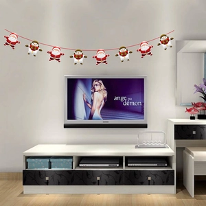 Christmas paper bunting featuring Santa Claus and snowman patterns for wall decoration