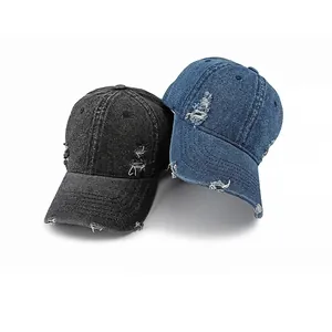 Washed denim baseball cap with distressed rip details in black and blue styles