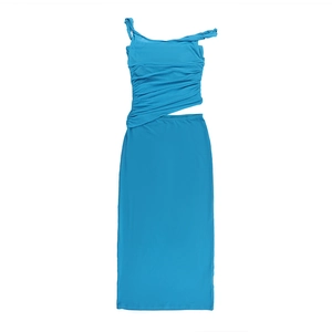Close-up of bright blue asymmetric pleated mesh fabric on bodycon summer dress