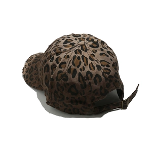 Detailed back view of distressed leopard print baseball cap with adjustable metal buckle strap