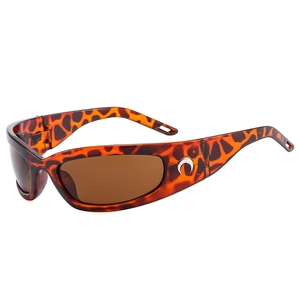 Futuristic Y2K wrap-around sunglasses with tortoiseshell frame and silver moon logo