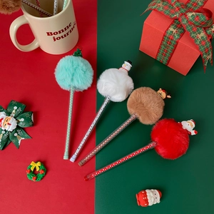 Stylos de Noël avec pompons doux et figurines de Père Noël et rennes mignons