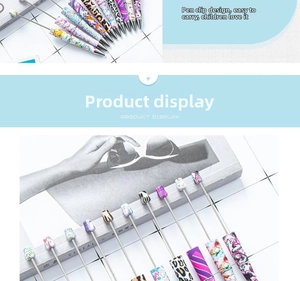 Detail of printed beadable pens featuring trendy leopard and floral patterns with clip design