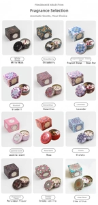Collection of 12 scented soy candles in colorful mandala tin cans with matching gift boxes