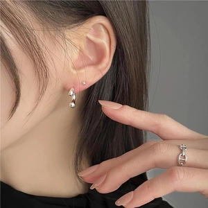 Minimalist 925 sterling silver U-shaped curved earrings and anchor chain ring on model