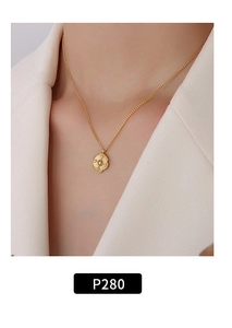 Detailed close-up of a 18K gold plated U-shaped necklace with zircon on a model's neck
