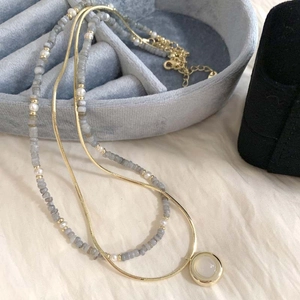 Layered gold snake chain with aquamarine pendant and pearl beaded necklace set