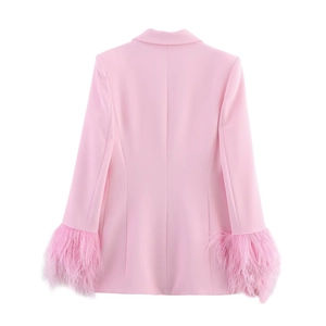Pink women's suit jacket with feather cuffs shown from the back on a white background