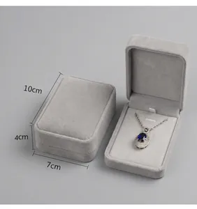 Detailed view of a white velvet large pendant jewelry box measuring 10x7x4cm