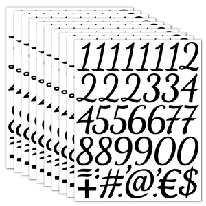 Close-up of 10 sheets black vinyl 2 inch numbers and symbols waterproof craft stickers