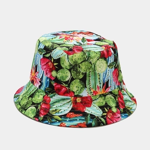 Detail of tropical cactus and red floral pattern on the reversible cotton sun hat