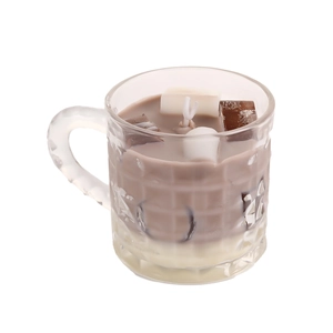 Vertical striped glass candle holder with dual-layer brown and cream scented wax topper
