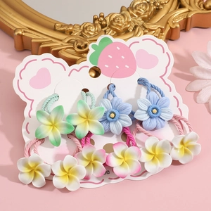 Set of 8 cute floral elastic hair ties with daisies and plumeria on display card