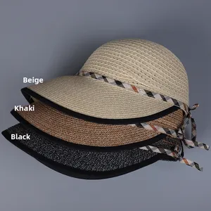 Straw sun hats in beige, khaki, and black with elegant plaid ribbon bows and piping