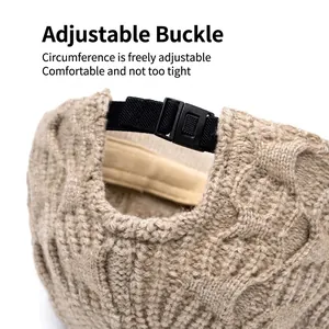 Oatmeal knit baseball cap with thick cable pattern and adjustable rear buckle strap