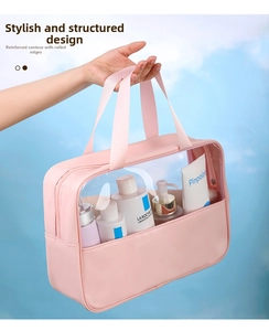Pink semi-transparent toiletry bag with leather trim and reinforced handle