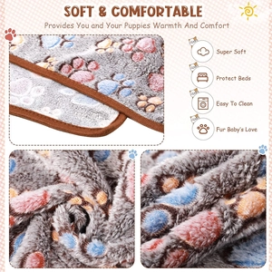 Macro view of soft grey fleece pet blanket showing plush texture and colorful paw prints