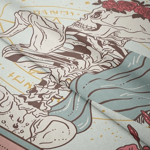 Detailed macro view of Bohemian skull tapestry showing fine fabric texture and floral print