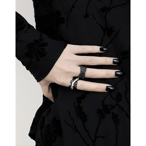 S925 silver woven hollow ring set with blue zircon in vintage black silver finish