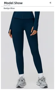 Detail of badge blue yoga set with long sleeve zipper top and high waist leggings