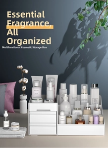 Macro detail of white desktop organizer with tiered slots and dual drawers for cosmetics