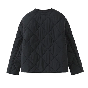 Back view detail of black quilted jacket with classic diamond pattern and glossy finish