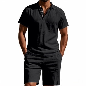 Detail of black cotton linen Polo and shorts set showing breathable fabric texture