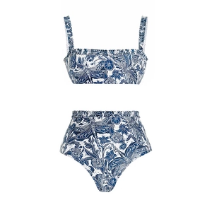 Detailed view of ruffled bikini top and high-waisted bottoms with blue dragonfly print