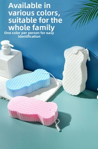 Detailed view of three soft bath sponges with fish scale texture and hanging ropes