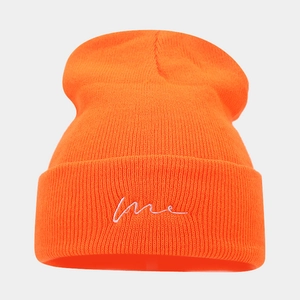 Orange knitted beanie with love embroidery featuring ribbed texture for winter warmth