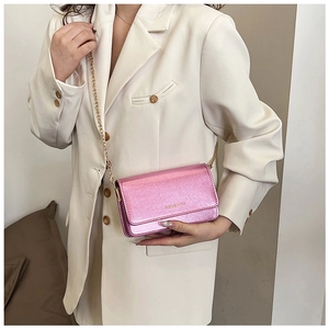 Pink metallic texture small square bag with fine gold chain strap and branding detail