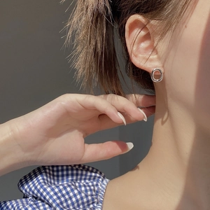 Minimalist 925 sterling silver hollow oval stud earrings with a polished metallic finish