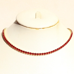 Elegant gold tennis necklace featuring vibrant red round-cut zircons for a hip hop style