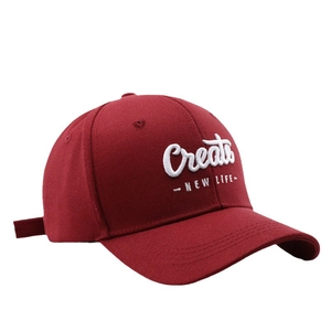 Red cotton baseball cap with white Creat letter embroidery and adjustable back strap