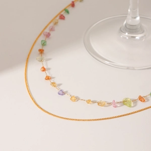 Double-layered gold stainless steel necklace featuring colorful natural stone fragments