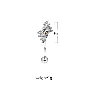 Detail of silver curved barbell eyebrow ring with marquise zircon and 9mm ornament