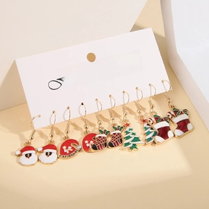 Detail of 6-pair Christmas earring set with enamel Santa, tree, and sock charms