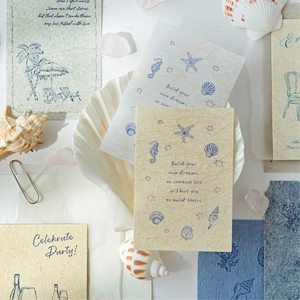 Vintage ocean-themed handmade paper card set with nautical illustrations and shells