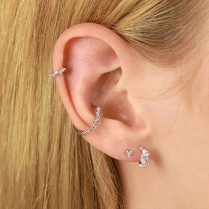 S925 silver irregular wave hoop earrings with pavé zircon stones on female model