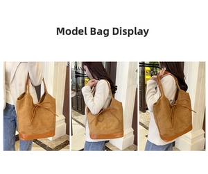 Detail view of large brown suede tote bag with leather bow decoration and sleek texture